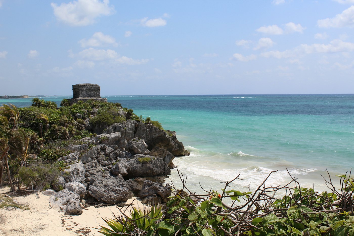 Mayan ruins on the rocky coastline above the Caribbean Sea in Tulum, Mexico